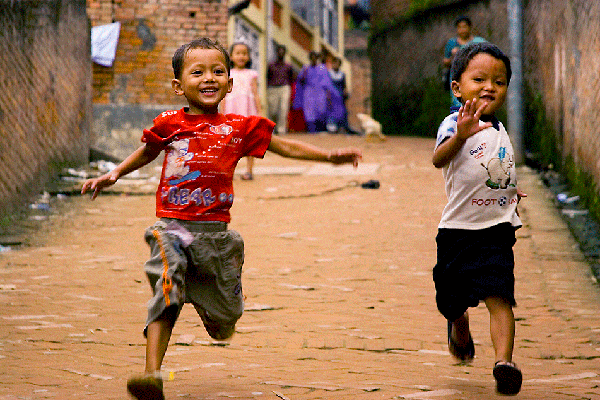 two young boys running